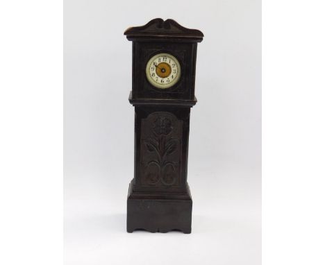 A late 19thC miniature longcase clock, brass dial with enamel chapter ring bearing Arabic numerals, movement by The Hamburg A