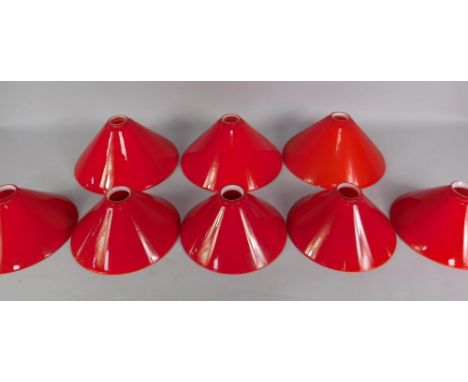 Eight red snooker and pool hanging ceiling light shades, comprising three large and five small.