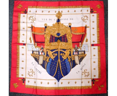 A Hermes of Paris silk scarf, decorated with an elaborate banner and coat of arms, titled Vue du Carosse de la Galerie la Rea