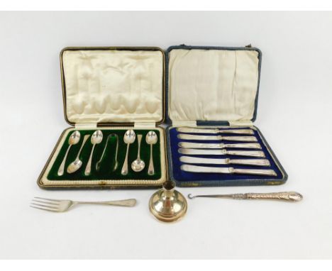 A set of six Edward VII silver coffee spoons and a pair of sugar tongs, with bright cut engraving, cased, Sheffield 1905, a s