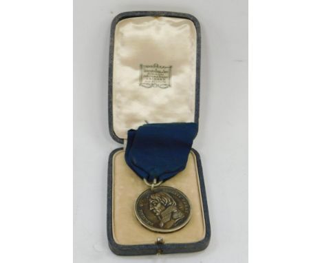 A Greenwich Hospital School Reward Medal, observe bust portrait of Admiral Lord Nelson, by Halfhide, and Palmam Qvi Mervit Fe