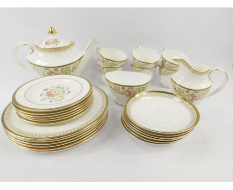 A Royal Doulton porcelain part tea service decorated in the Lichfield pattern, comprising teapot, cream jug, sugar bowl, six 