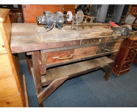 A pine workbench with a fitted watchmakers lathe. with electric generator, single drawer containing numerous further tools, a
