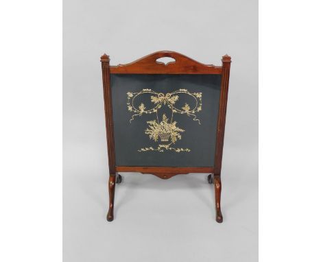 An Edwardian mahogany fire screen, with wool work inset, decorated with a basket and swags of flowers, united by a tied bow, 