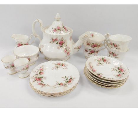 A Royal Albert porcelain part tea service decorated in the Lavender Rose pattern, comprising teapot, cream jug, sugar bowl, f