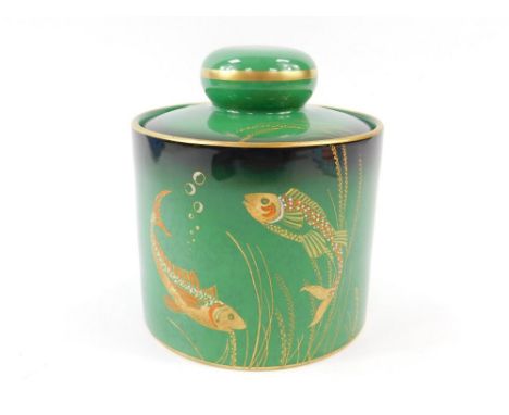 A Carltonware pottery tobacco jar for Dunhill, decorated in gilt and enamel with fish against a green ground, shape no 1989, 