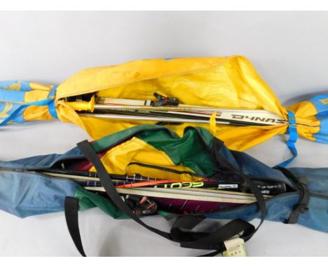 A pair of Ceramic glass fibre reinforced skis, lightweight with laser controlled base tuning, together with a pair of Omega D