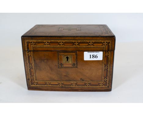 A Victorian walnut rectangular tea caddy with geometric inlay, twin compartments to the interior, 20 x 13cms, est £40 - £60