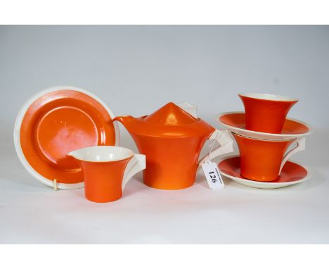 An unusual Clarice Cliff part tea set in orange &amp; white comprising a teapot, cream jug, sugar basin, 1 cup &amp; 3 plates