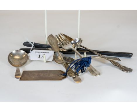 A pair of silver marked ebony glove stretchers, London 1918, a silver caddy spoon, maker: TB&amp;S, Sheffield 1912, six other