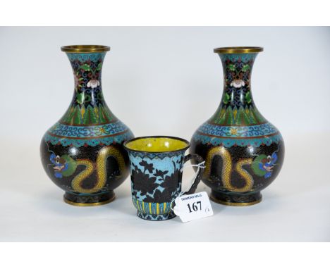 An unusual 19th century blue ground Chinese cloisonné enamel beaker with bamboo effect side handle, 7.5cms and a pair of Chin