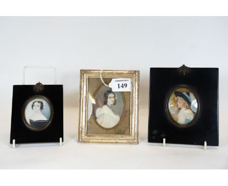 A late Victorian / Edwardian oval painted miniature, half length portrait of a young lady, unsigned, 9 x 6 cms, a miniature d