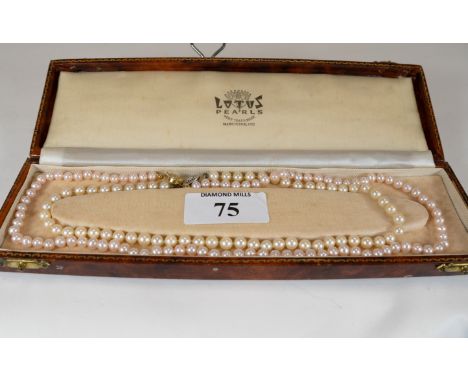 A Cultured pearl necklace with 14k white gold clasp, 36cms and a cultured pink pearl necklace with gilt-metal clasp (2), est 