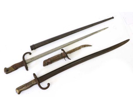 A French M1866 Chassepot Yataghan Sword Bayonet, with T section steel blade , crossguard and brass ribbed hilt, lacks scabbar