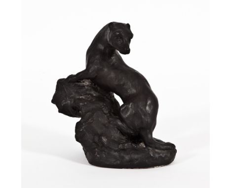 * THOMAS SYMINGTON HALLIDAY MBE FRSA (SCOTTISH 1902 - 1998),
OTTER
painted ceramic, signed
18cm high