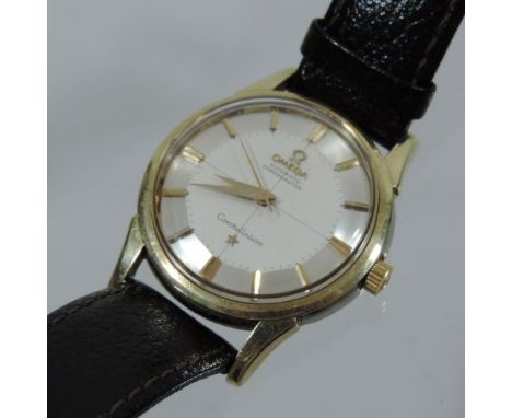 A vintage Omega Automatic Chronometer Constellation 9 carat gold and steel cased gentleman's wristwatch, on a black leather s