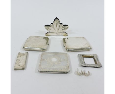 An early 20th century silver cigarette case, 9cm, together with another and various silver and plated items