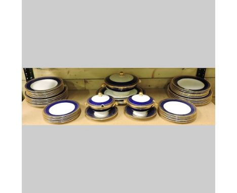 A collection of Copeland Spode dinner wares, with cobalt blue and gilt decoration, to include meat plates and tureens
