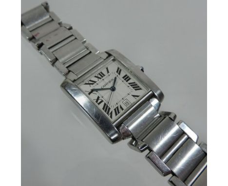 A Cartier gentleman's steel cased automatic wristwatch, the square dial with Roman hours and date aperture, on a flexible str