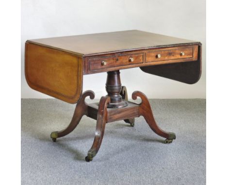 A Regency mahogany and ebony strung sofa table, with a hinged rectangular top, on a splayed platform base, 148 x 70cm