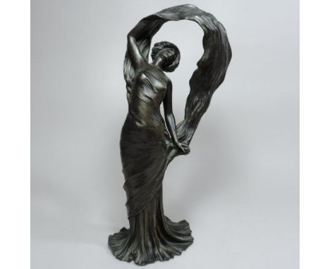 An Art Nouveau style bronzed figural table lamp, in the form of a young lady holding a flowing dress in the air, signed L. Al