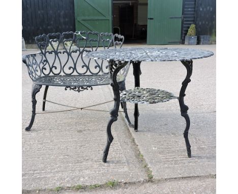 A black painted metal garden table, 80cm, together with a matching bench