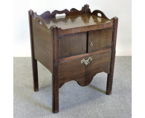 A George III mahogany tray top commode, with a gallery top, enclosed by a pair of panelled doors, on square moulded legs, 60c