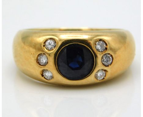 An 18ct gold ring set with approx. 0.12ct of diamond & sapphire, 5.5mm diameter, 7.8g, size K