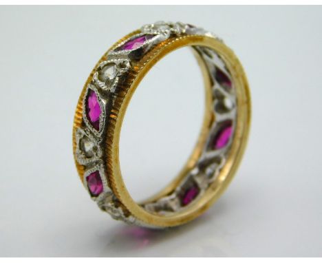 A 9ct gold eternity ring set with diamonds in heart shaped mounting & marquise cut rubies, 3.3g, size K