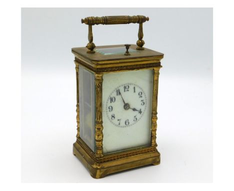 A French brass repeater carriage clock by R & Co. Paris, crack to bottom left of dial face, 158mm tall