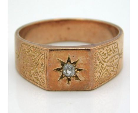 A 9ct gold rose gold ring with faceted shoulder & chased decor, set with small diamond, 6.9g, size U/V