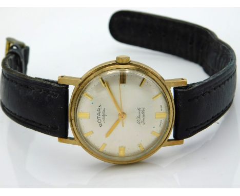 A yellow metal Rotary 17 jewel wristwatch with leather strap, case 34mm diameter, running