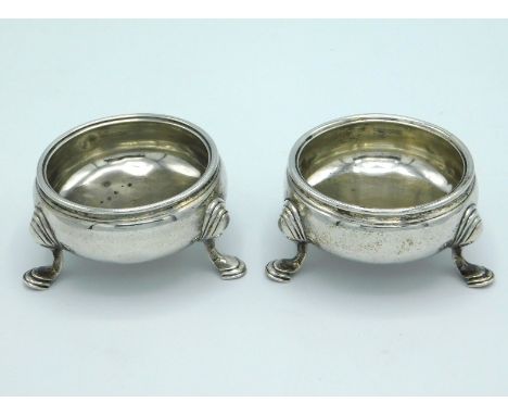 A pair of 1755 George II London silver salts, rubbed mark, probably Peter Werritzer, etched to underside HMP with military br