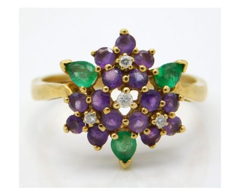 An 18ct gold cluster ring set with diamond, emerald & amethyst, 5g, size S/T