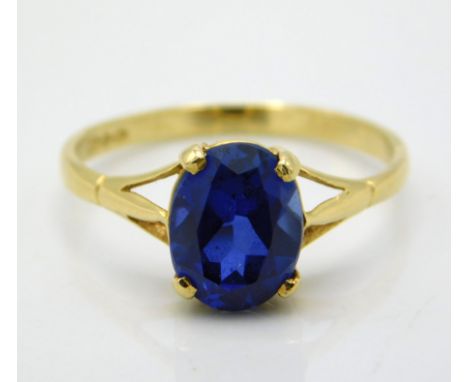 An 18ct gold ring set with vibrant Kashmir style sapphire, 9mm x 7mm, 2.2g, size O/P