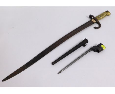 A French Chassepot bayonet lacking scabbard, 690mm long, twinned with a British spike 'pigsticker' bayonet with scabbard, 262