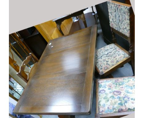 A twentieth century oak extending refectory dining table and two oak ladder back chairs and Edwardian dining chairs and a sta