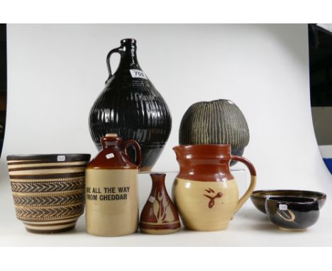 A collection of vintage studio art pottery including large stoneware bottle flask,Gillian Lowndes vase, various vases, jugs a