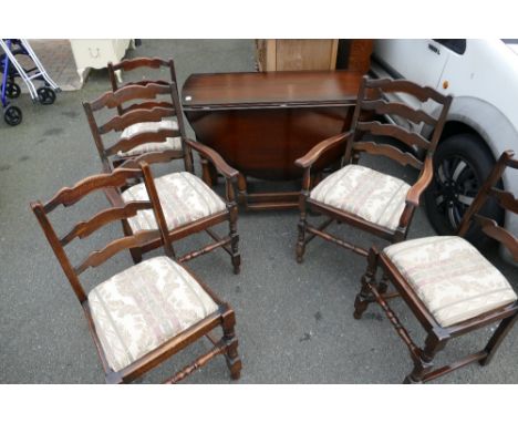 Twentieth century oak drop leaf dining table with five ladder back chairs including two carvers (6)