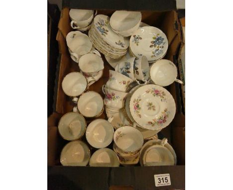 A mixed collection of ceramic items to include Royal Albert Moss Rose cups and saucers, Old Country Rose mugs, Royal Standard
