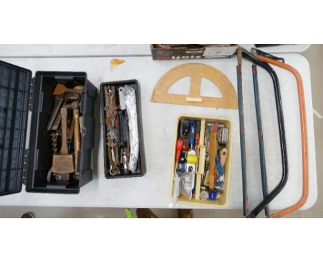 A mixed collection of tools to include, vintage woodworking tools, saws and other modern tools