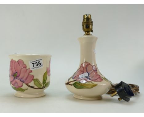 A Moorcroft lamp base and matching jar. (2)