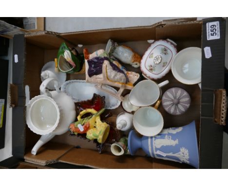 A mixed collection of ceramic items to include lilac Wedgwood lidded jar, similar blue jasper footed vase, novelty character 