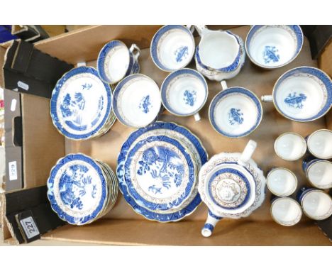 A collection of Booths Real Old Willow decorated dinnerware including cups, saucers, side plates, miniature teapot, egg cups 