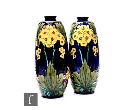 Mintons Secessionist - An early 20th Century pair of vases of swollen sleeve form with a narrow collar neck, tube line decora
