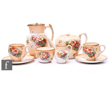 Wiltshaw &amp; Robinson - Carltonware - A Dog Rose pattern tea-for-two set, circa 1890, decorated with raised enamelled flowe