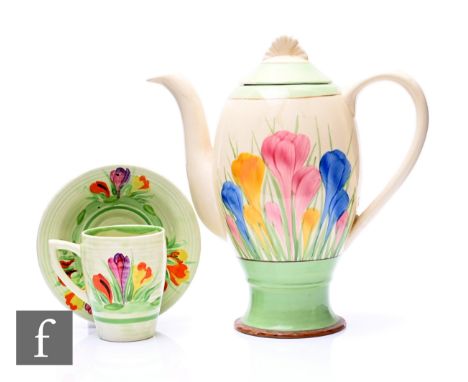 Clarice Cliff - Summer Crocus - A Lynton shape coffee can and saucer circa 1934, hand painted with Crocus sprays with green b