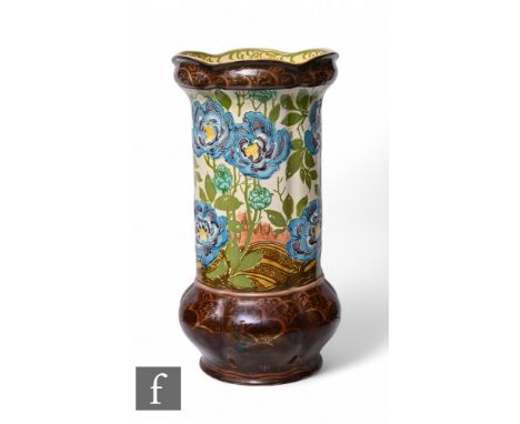 Mintons Ltd - A large stick stand circa 1900,&nbsp;of fluted sleeve form with swollen base, relief decorated with flowers and