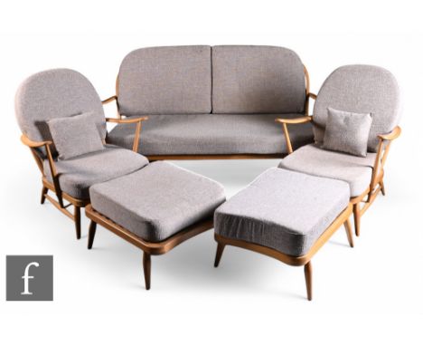 Lucian Ercolani - Ercol Furniture - A beech framed five-piece lounge suite, comprising of a model 203 Windsor bergere three-s