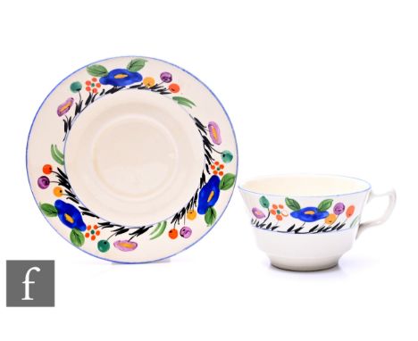 Dolly Cliff - Perdita's Garden - An Athens shape tea cup and saucer circa 1929, hand painted to the border with a band of sty